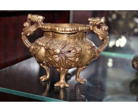A Sino-Tibetan bronze buddha, 18cm high; together with two bronze twin handled censers.