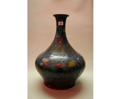 A large Chinese cloisonne enamel baluster vase, 47cm high, (s.d.). Condition Report: Several damaged areas around bulbous par