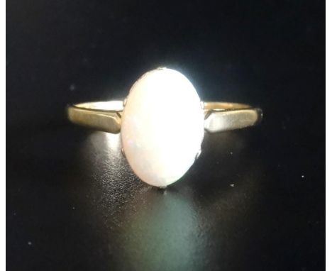 OPAL SINGLE STONE RINGthe oval cabochon opal on nine carat gold shank, ring size P 