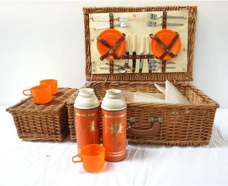 OPTIMA WICKER PICNIC HAMPERwith a fitted interior for four people comprising cutlery, plates, cups and saucers, flasks, condi