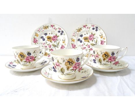 COALPORT SAN REMO PATTERN TEA SETwith floral decoration on a cream ground, comprising ten cups, saucers and side plates 