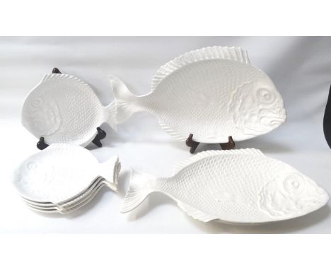 FIVE PORTUGUESE POTTERY FISH PLATESeach modeled as a textured fish, 29cm long, together with two similar fish serving dishes,