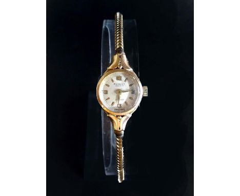 LADIES ROTARY NINE CARAT GOLD WRISTWATCHthe dial with Arabic numerals at 3, 6, 9 and 12 and baton five minute markers, with 2