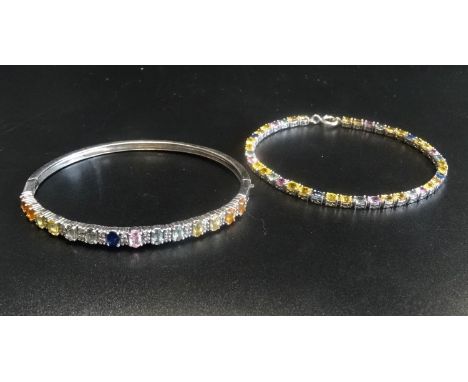 MULTI COLOURED SAPPHIRE BANGLE AND BRACELETboth in silver, the bangle with safety clasp, the line bracelet approximately 19.5