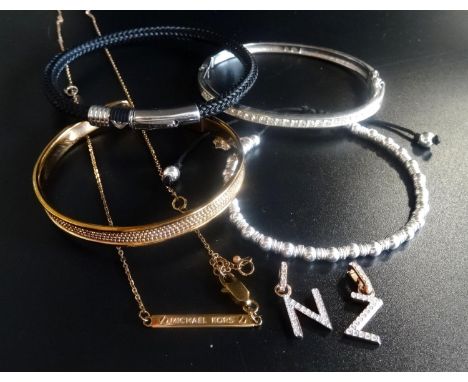 SELECTION OF FASHION JEWELLERYcomprising a Swarovski crystal bangle, two Swarovski crystal letter pendants (N and Z), a Dower