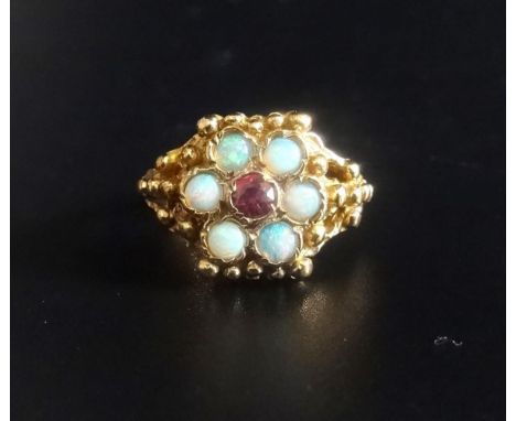 OPAL AND PINK GEM SET CLUSTER RINGthe central pink gemstone in six opal surround, on nine carat gold shank with ornate settin