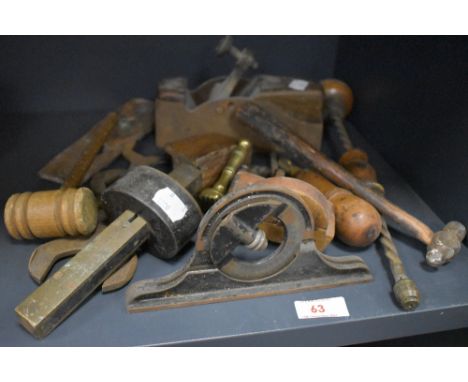 A selection of antique and later woodworking tools including hollow handle tool, Archimedes drill and engineers square