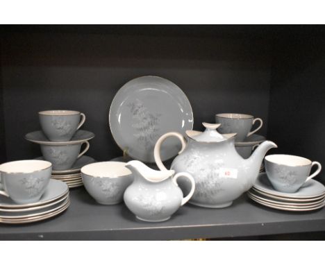 A part tea service by Royal Doulton in the Forest Glade design having a duck egg blue on white glaze and in fine condition