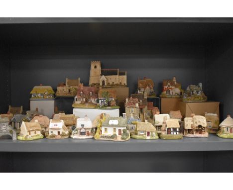 A selection of model houses and cottages by Lilliput lane