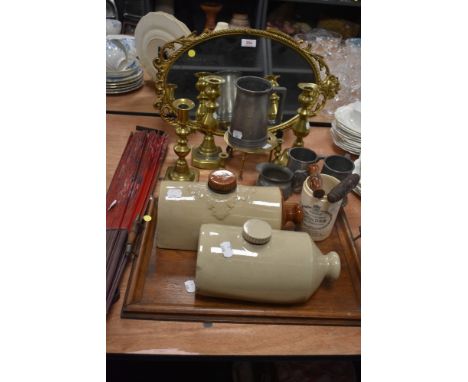 A mixed lot of items including vintage brass and pewter wares,two stone hot water bottles, mirror, tray and more.