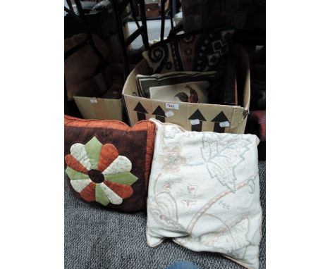 A mixed box of vintage and similar cushions.
