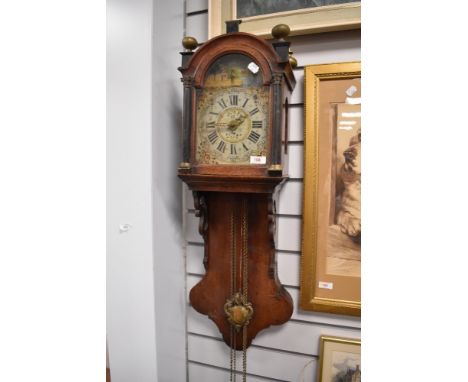A Victorian Frisian tail wall clock having painted face and mahogany case