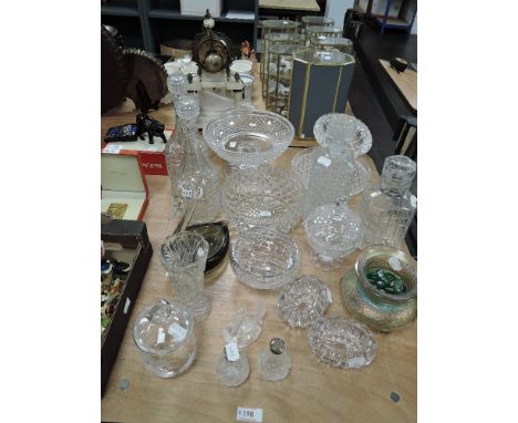 A selection of vintage clear cut and pressed glass wares including iridescent Loetz style vase