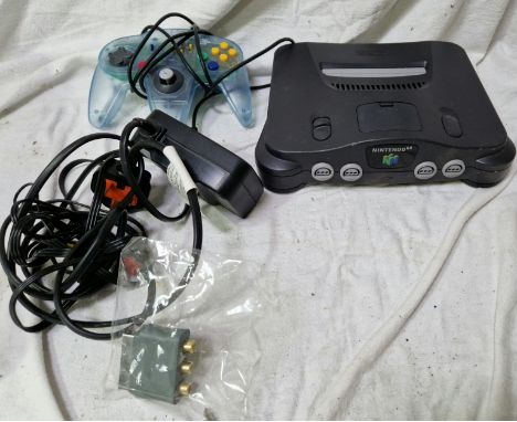 A Nintendo 64 console, controller and cables.  