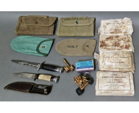 A box containing assorted militaria to include 2 fighting knifes (1 marked William Rodgers made in Sheffield), various canvas
