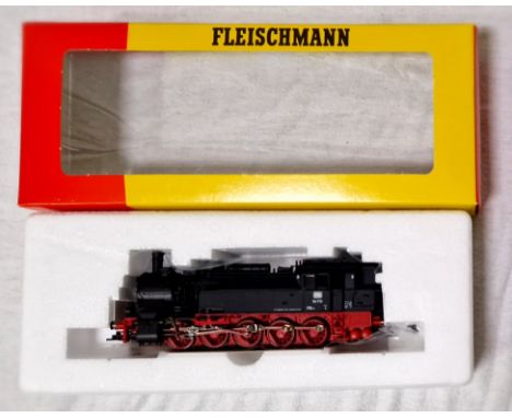 A Fleischmann locomotive 4090 DB 94713, mint in box. (Vendors father brought back 2 items each time from Germany on holiday t