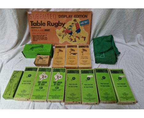 A vintage Subbuteo table rugby game, 3 boxed rugby teams, 7 boxed soccer teams and football playing cloth and accessories.P&P