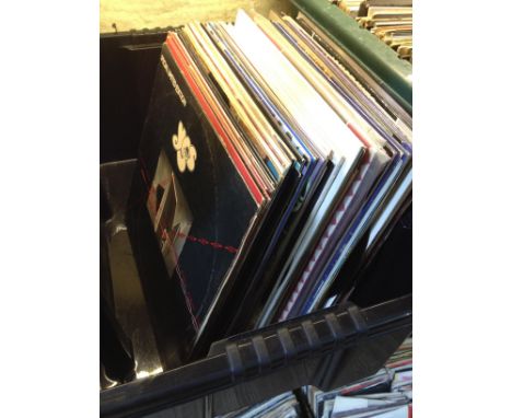 A box of approx. 59 LP records and some singles, circa 1970s and 1980s including Rolling Stones, Yes, limited edition Meatloa