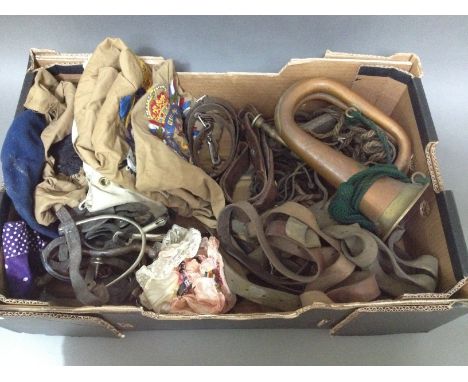 A selection of military items including WW1 cavalry spurs, various cloth patches with embroidered blazers to include Honi Soi