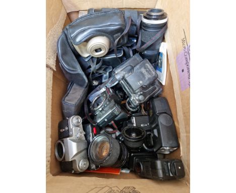 A box of cameras and camera equipment including lenses etc.  
