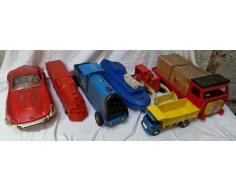 A group of large vintage toys to include horn sound making train &amp; boat, 2 x Tri-ang trucks and a Johnny Speed car.  