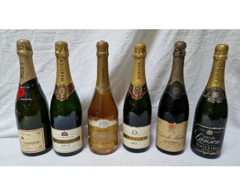Six bottles of vintage champagne.