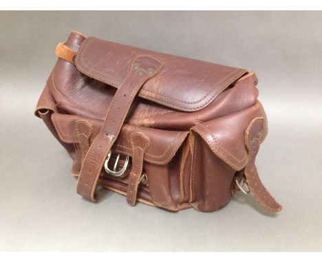 A vintage leather rucksack.  