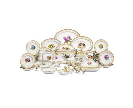  Luxurious KPM porcelain dinner service decorated with painted flowers and gold. With flower bouquets and festive frames. Ber