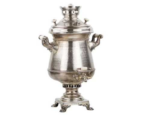  Large, silver, Russian samovar made of 84 silver, trading house I.E. MOROZOV. Mounted on a stand with four figured legs in t
