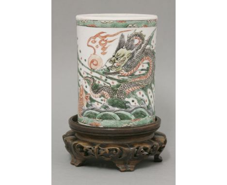 A famille verte Bitong, Kangxi (1662-1722), painted with panels of a leaping carp and a dragon, the reverse with birds and pr
