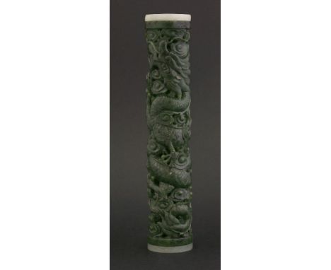 A good spinach green jade Incense Burner 20th century, pierced and well carved with a dragon amongst clouds,the ends with key