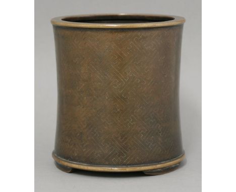 An inlaid copper Bitong, 18th century, the gently waisted body inlaid in silver in the style of Shi Sou, with key fret and on