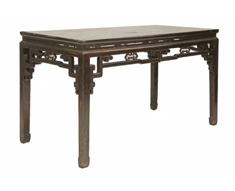 A hardwood Side Table (Zhuo), c.1850, the plain top above a frieze of stylised archaic dragons and medallions, upon square le