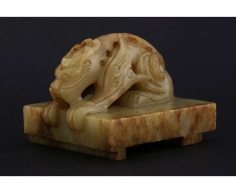 An unusual jade Seal, in the form of Pixiu, the dragon-like beast powerfully carved in the Yuan style with bifid tail, two ho