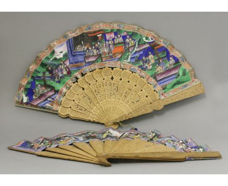 An unusual Canton Fan, early 19th century, the leaf painted on both sides in an uncommon palette with figures on terraces, th