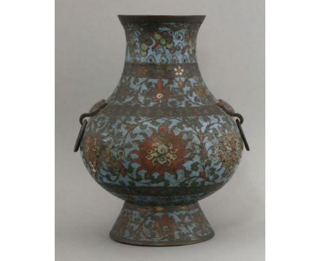 A cloisonné Vase (Hu), second half of the 17th century, the onion body with stylised lotus and scrolling green leaves on a du