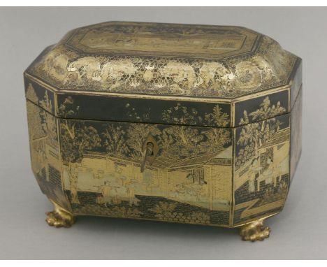 A Chinese lacquer Tea Caddy, c.1800, the canted rectangular body well lacquered in two tones of gold on a black ground with v