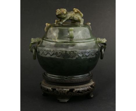 A jade Censer and Cover, 20th century, the drum body with a band of ruyi heads and with ruyi handles and loose rings, the cov