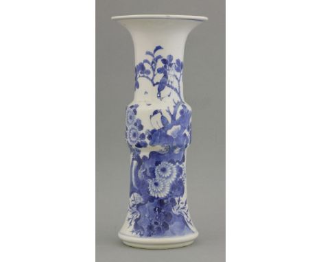 An attractive Gu Vase, mid 19th century, painted in underglaze blue in Kangxi style, with two finches on a branch or on rockw