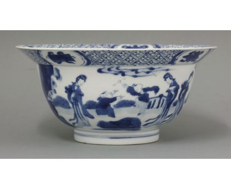 A blue and white Helmet Bowl, Kangxi (1662-1722), painted with ladies and boys in a garden, the rim with panels of precious o