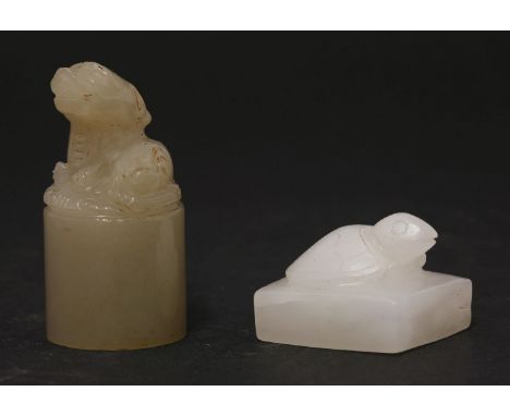 A white jade Seal, 20th century, the square slab set with a tortoise, four character seal mark, 2.5cm, and a cylindrical seal