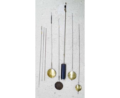 Regulator longcase clock pendulum, four other longcase clock pendulums and three rods