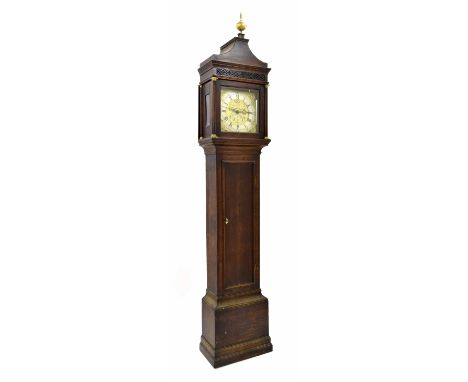 Oak thirty hour longcase clock, the 11" square brass dial with silvered chapter ring enclosing a foliate engraved centre sign