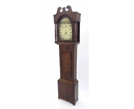 Oak and mahogany crossbanded thirty hour longcase clock, the 12" painted arched dial with calendar aperture, the case with sh