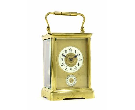 French alarm carriage clock striking on a gong, the 2" cream chapter ring enclosing a gilt turned centre over an alarm dial, 