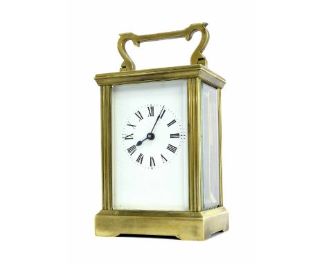 Brass carriage clock timepiece, within a corniche style case with fluted pilasters, 6" high (key)