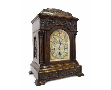 Oak triple fusee boardroom clock, the 6" rounded arched dial signed R. Jones & Sons, Liverpool on an arched plate to the mirr