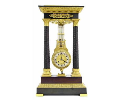 Fine French Empire bronze and ormolu portico two train swinging pendulum mantel clock, the 3.5" silvered chapter ring enclosi