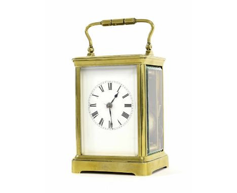 French carriage clock striking on a gong, within a corniche brass case, 7.25" high (key)