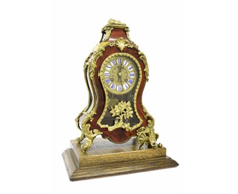 French tortoiseshell and gilt metal mounted two train mantel clock, the 3.75" gilded dial with Roman cartouche enamel numeral